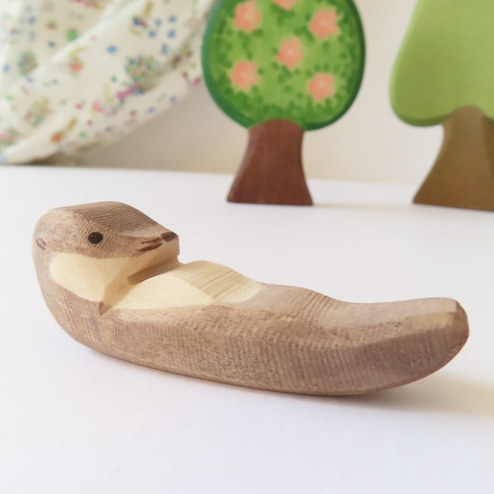 Ostheimer wooden toy animal - baby otter swimming